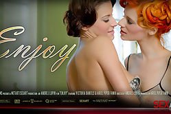 Redhead babe fools around with her brunette girlfriend in this glamorous sex scene. What a couple!