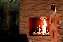 Glam brunette with big boobs performs a striptease at the fireplace when she wants to orgasm