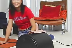 Excited brunette lubes a fucking machine and sits down on it to get a fantastic solo orgasm