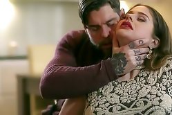 Alluring brown haired sweetie gets sued by a tattooed hunk in this super hot sex session