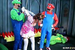 Kinky brunette puts on a princess outfit to fool around with Mario and his brother in an orgy