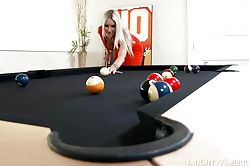 Blonde loves playing billiards so much